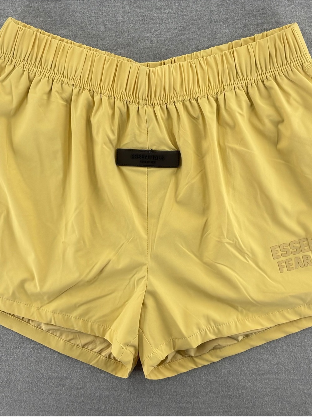 Essentials Women's Yellow Athletic Pull-On Shorts